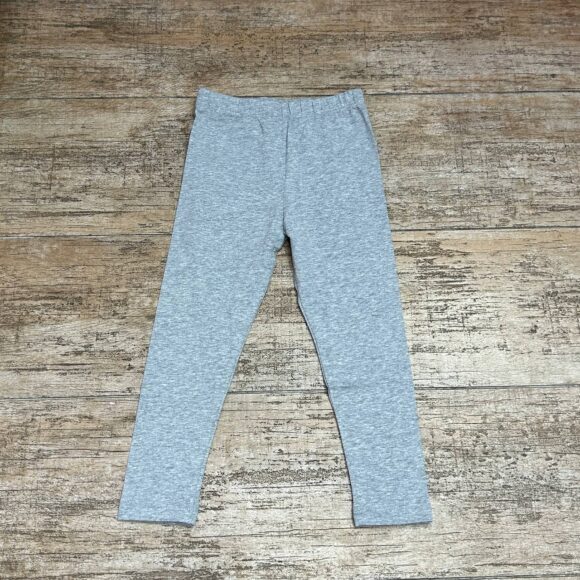 Misty Grey leggings flat lay on wooden background